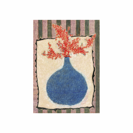 Decorative rug with a blue vase and red flowers on a striped background