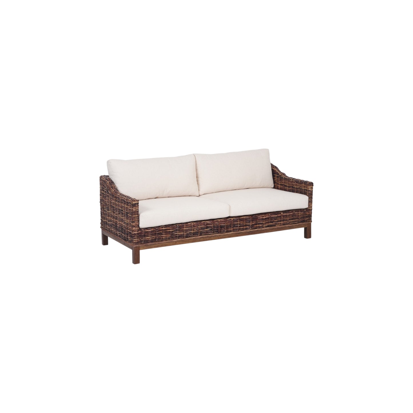 Wicker outdoor sofa with white cushions on a white background
