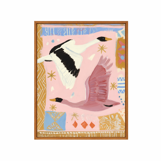 Framed artwork with two swans on a pink background