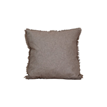 Brown pillow with frayed edges on a white background